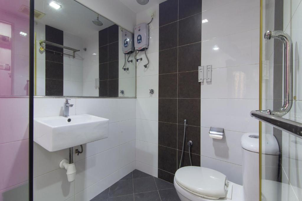 Koupelna v ubytování Super OYO 90296 Red Orange Hotel Port Klang
