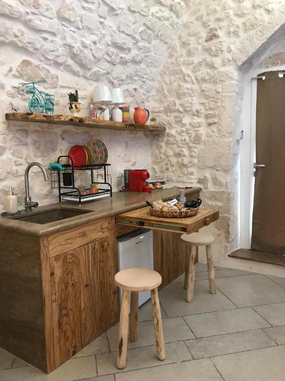 Kuchyň nebo kuchyňský kout v ubytování Luxury Suite Of Ostuni