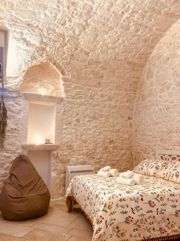 Postel nebo postele na pokoji v ubytování Luxury Suite Of Ostuni