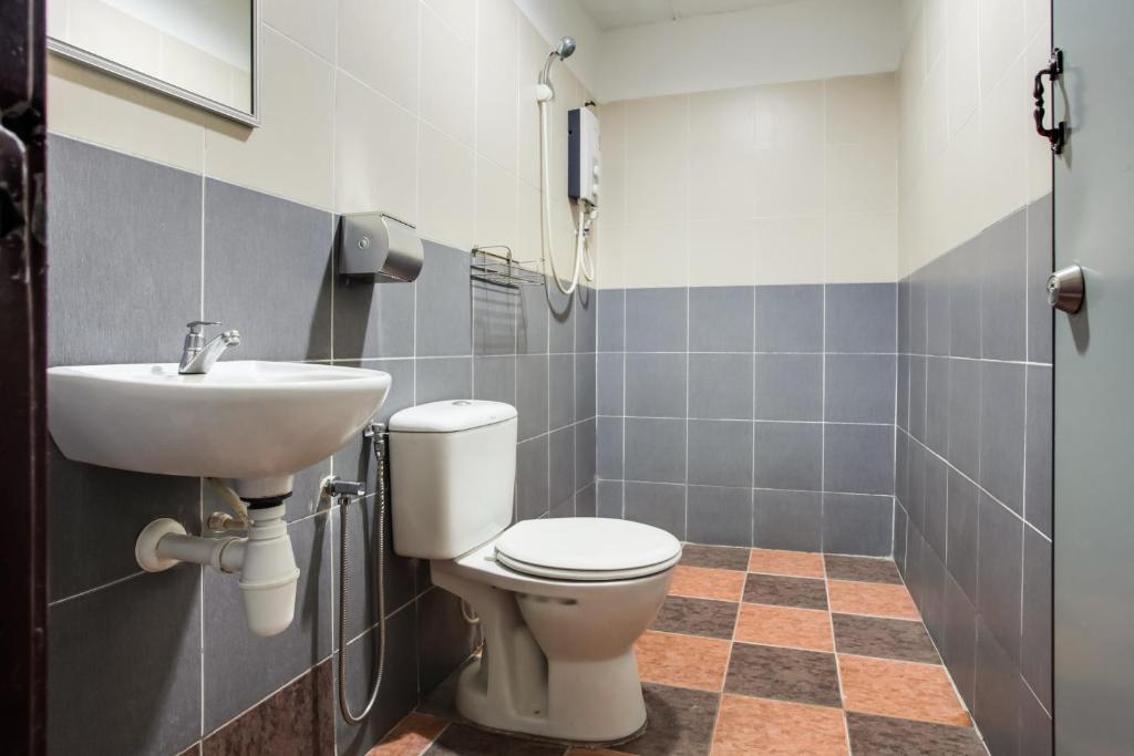 Koupelna v ubytování Super OYO 89427 Kavanas Hotel Taiping