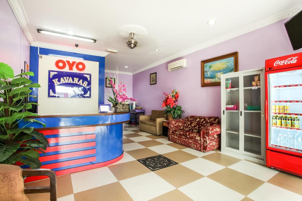 TV a/nebo společenská místnost v ubytování Super OYO 89427 Kavanas Hotel Taiping