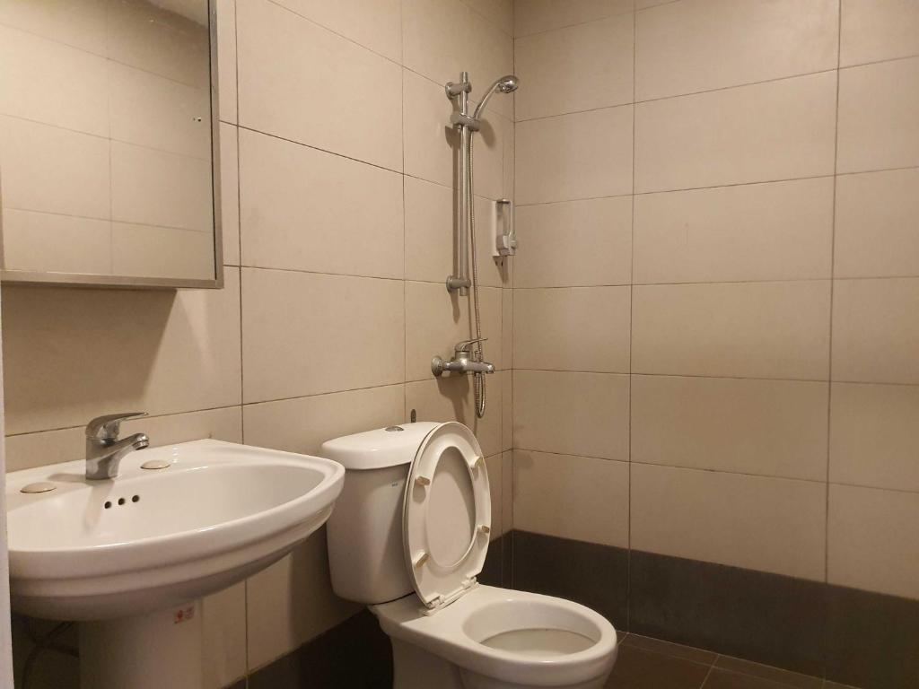 Koupelna v ubytování OYO 91053 Signature Inn Miri