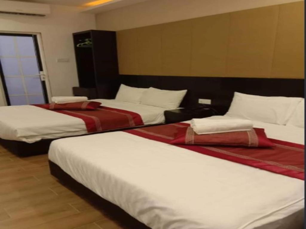 Postel nebo postele na pokoji v ubytování OYO 91087 Hotel Dspark Port Klang