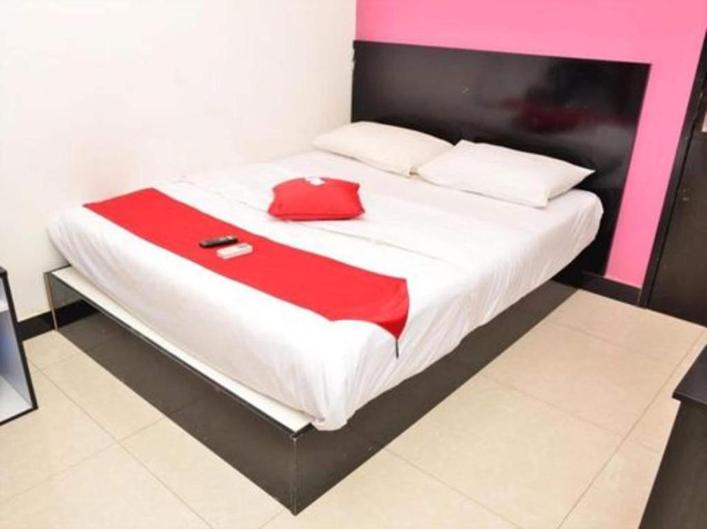 Postel nebo postele na pokoji v ubytování OYO 91087 Hotel Dspark Port Klang