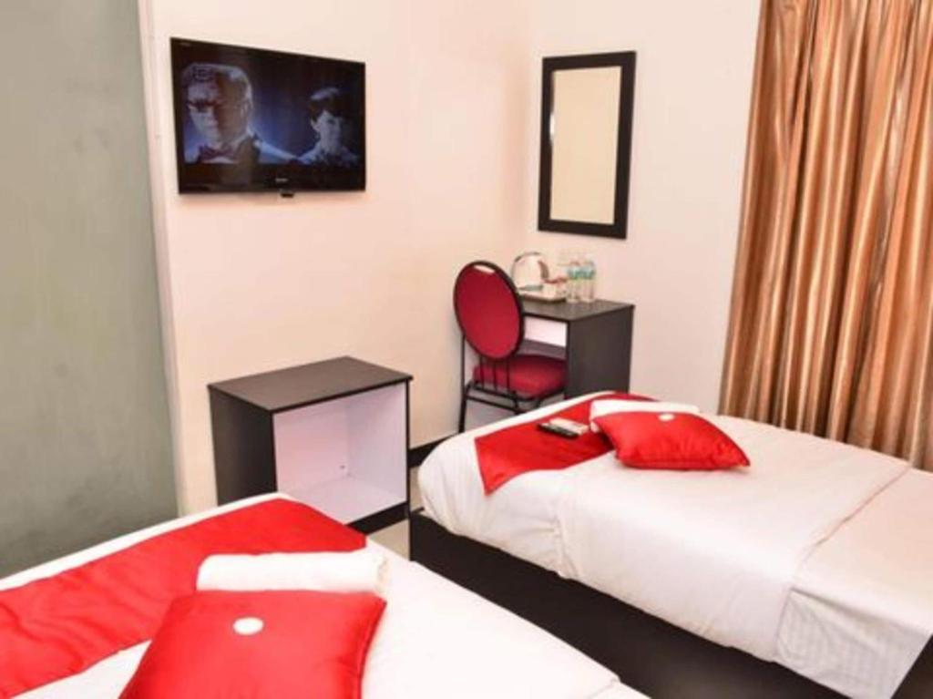 Postel nebo postele na pokoji v ubytování OYO 91087 Hotel Dspark Port Klang
