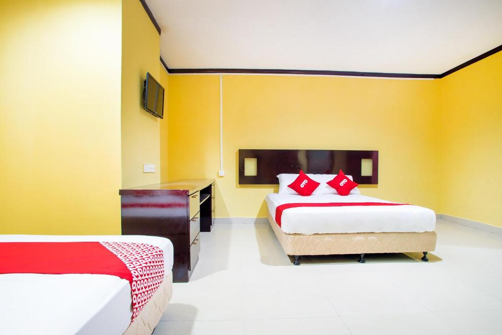 Postel nebo postele na pokoji v ubytování Super OYO 1219 Hotel Bbk