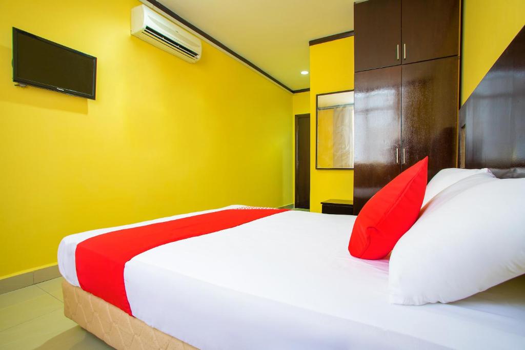 Postel nebo postele na pokoji v ubytování Super OYO 1219 Hotel Bbk