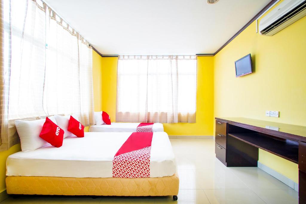 TV a/nebo společenská místnost v ubytování Super OYO 1219 Hotel Bbk