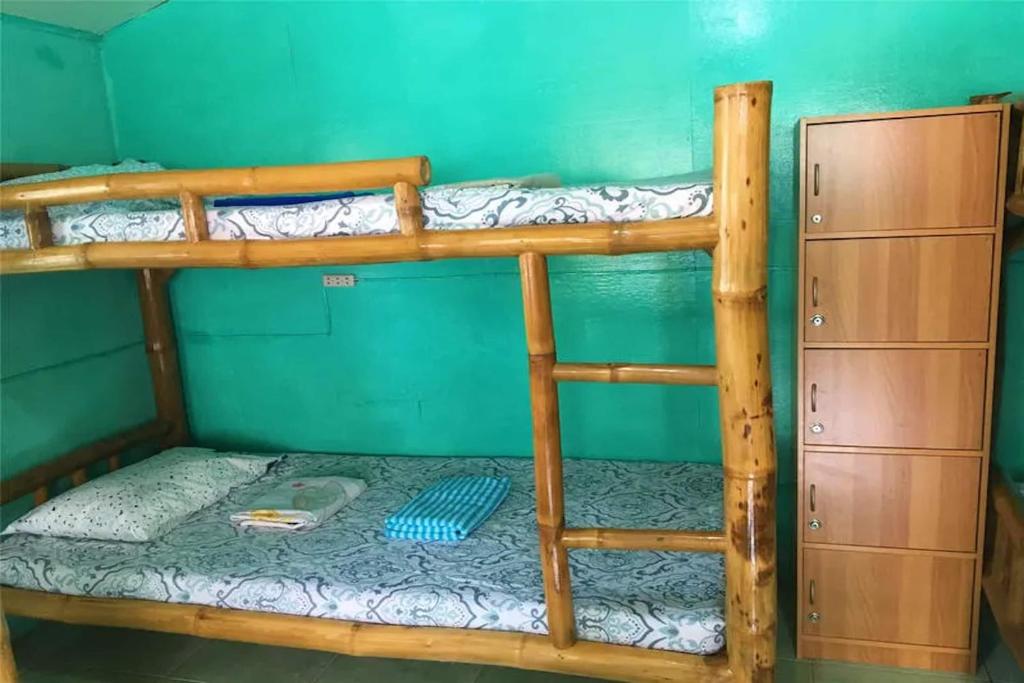 Postel nebo postele na pokoji v ubytování OYO 928 JJs Place