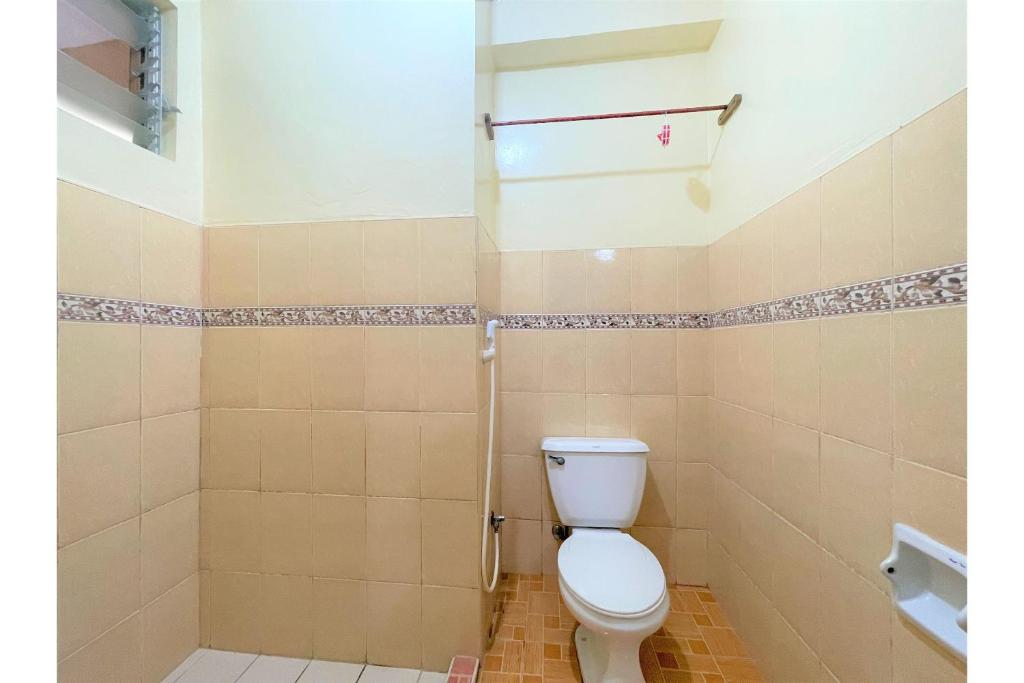 Koupelna v ubytování OYO 876 Escurel Inn Boracay