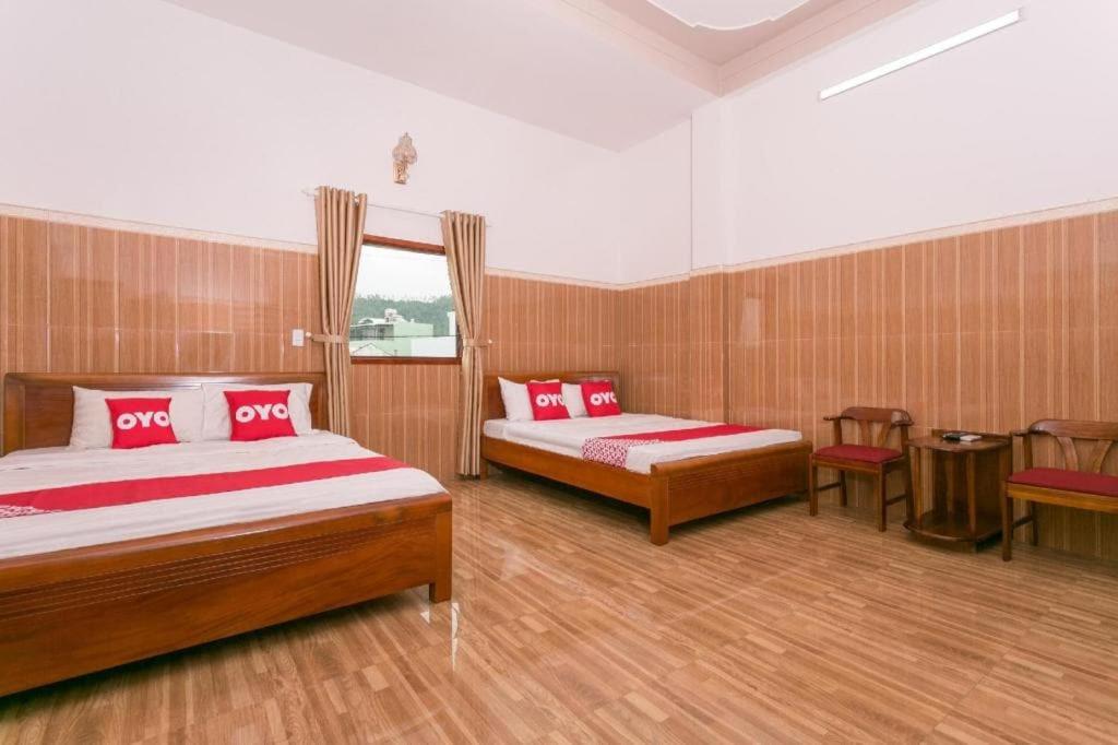 Postel nebo postele na pokoji v ubytování OYO 638 Thien Nam Hotel
