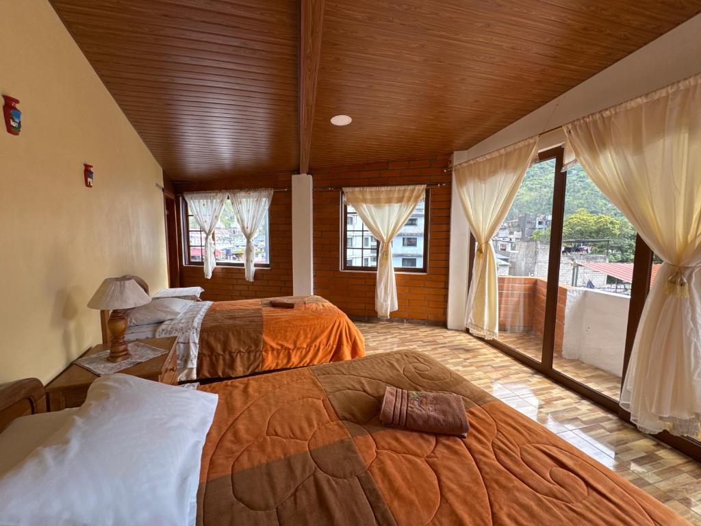Postel nebo postele na pokoji v ubytování Hotel Donde Ivan