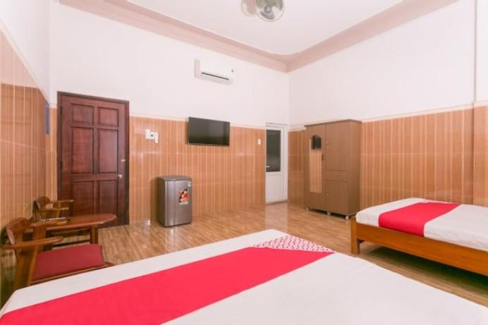 Postel nebo postele na pokoji v ubytování OYO 638 Thien Nam Hotel