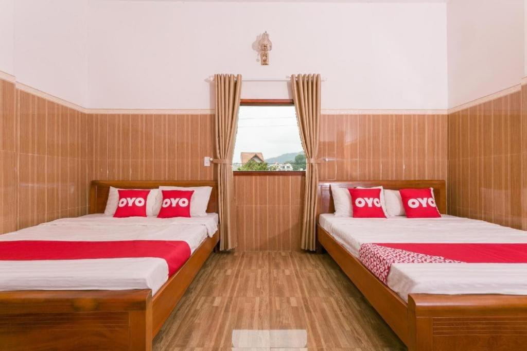 Postel nebo postele na pokoji v ubytování OYO 638 Thien Nam Hotel