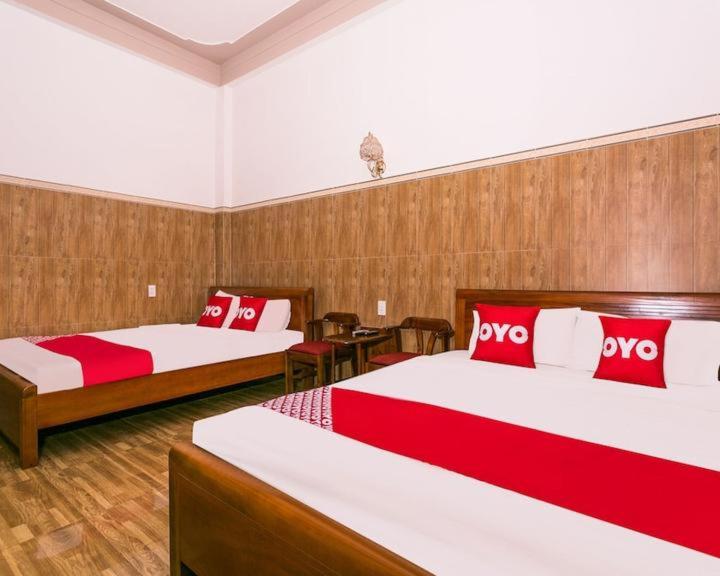 Postel nebo postele na pokoji v ubytování OYO 638 Thien Nam Hotel