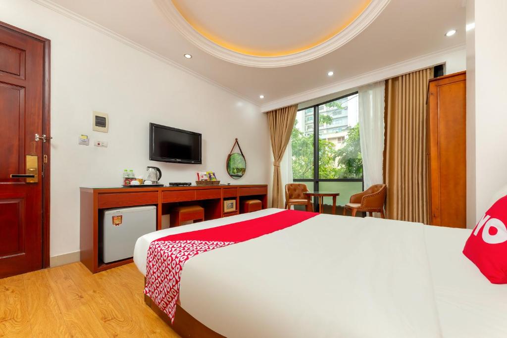 TV a/nebo společenská místnost v ubytování Super OYO Capital O 387 Bach Duong Hotel