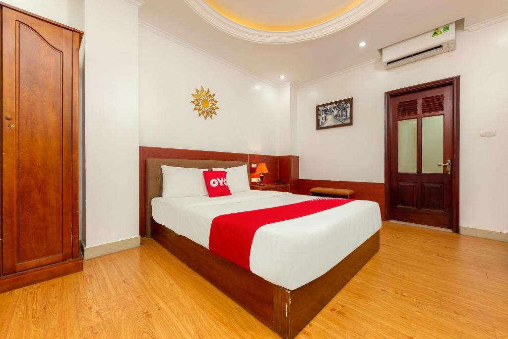 Postel nebo postele na pokoji v ubytování Super OYO Capital O 387 Bach Duong Hotel