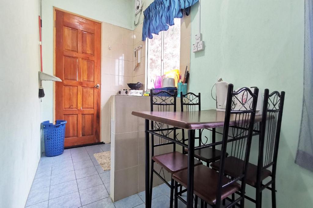 Fotografie z fotogalerie ubytování OYO Home 90339 Sosodikon Inap Desa v destinaci Ranau