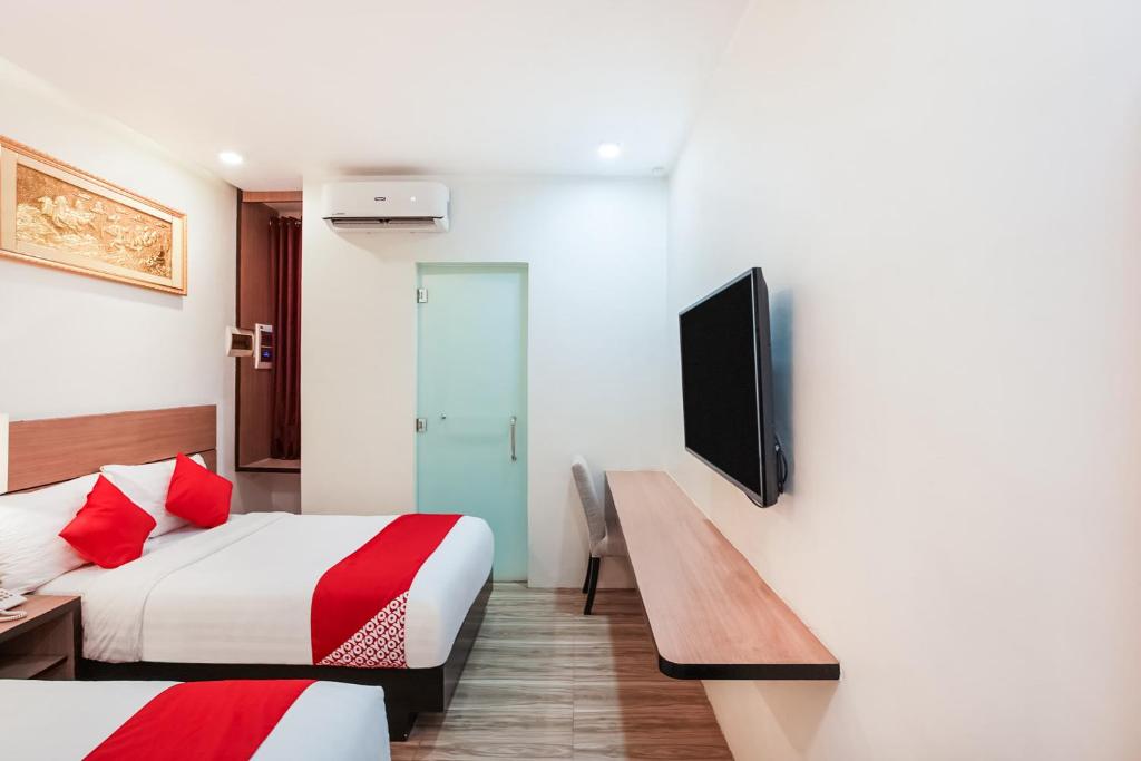 OYO 489 Casa Mia Hotel Suites - Superior Family Room