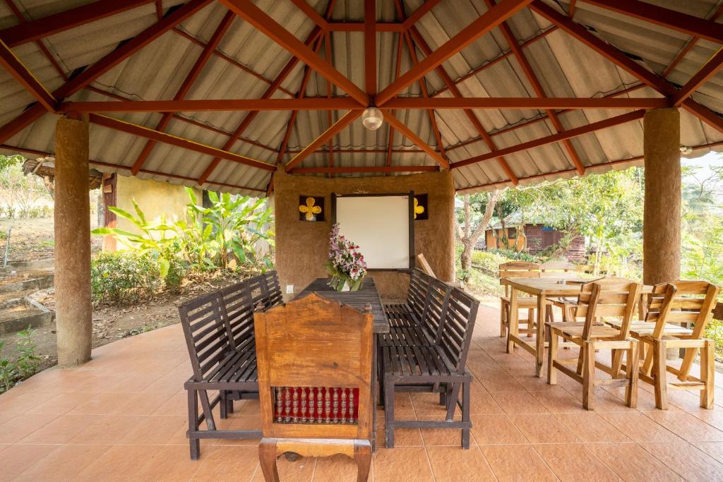 Fotografie z fotogalerie ubytování OYO 766 Zompo Baan Din Resort v destinaci Mae Taeng