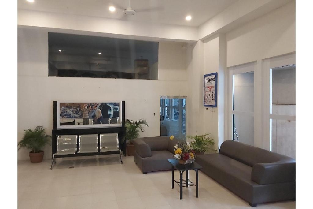 TV a/nebo společenská místnost v ubytování Nest Suites