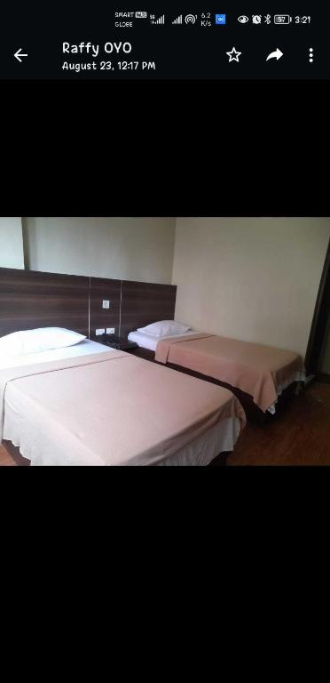 Postel nebo postele na pokoji v ubytování OYO 1011 First Hotel