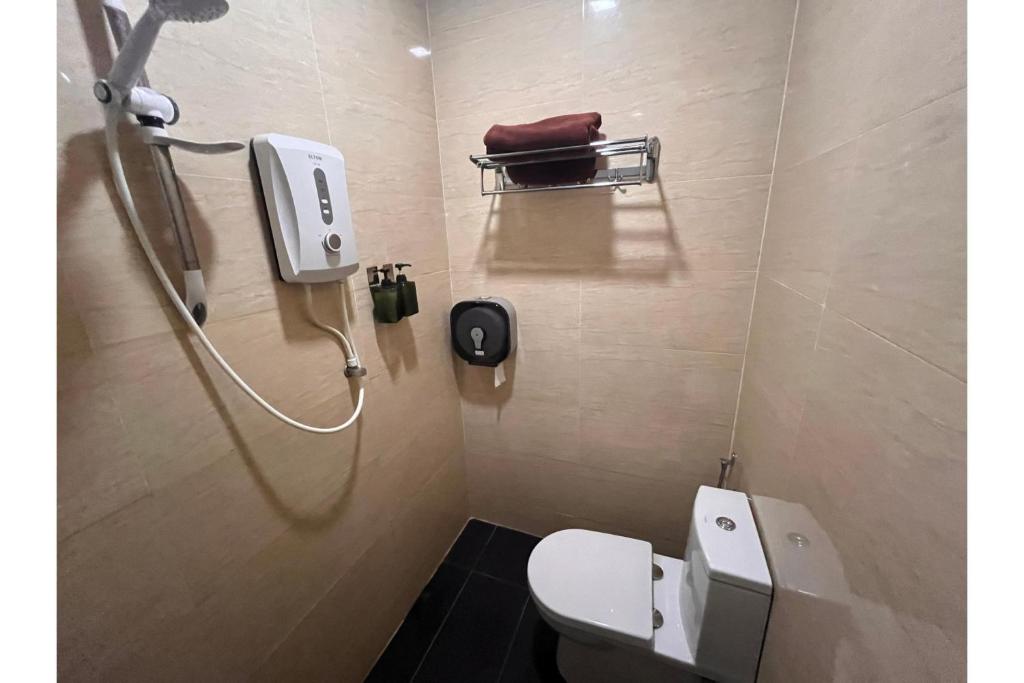 Koupelna v ubytování Grand World Hotel