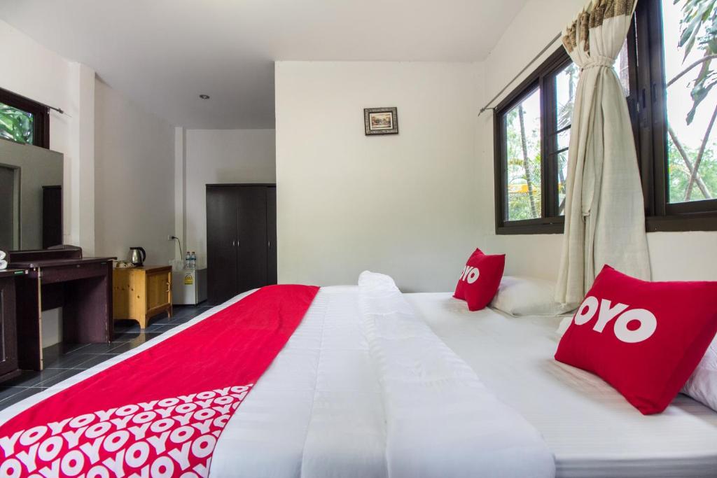 Postel nebo postele na pokoji v ubytování Piyapruk Resort