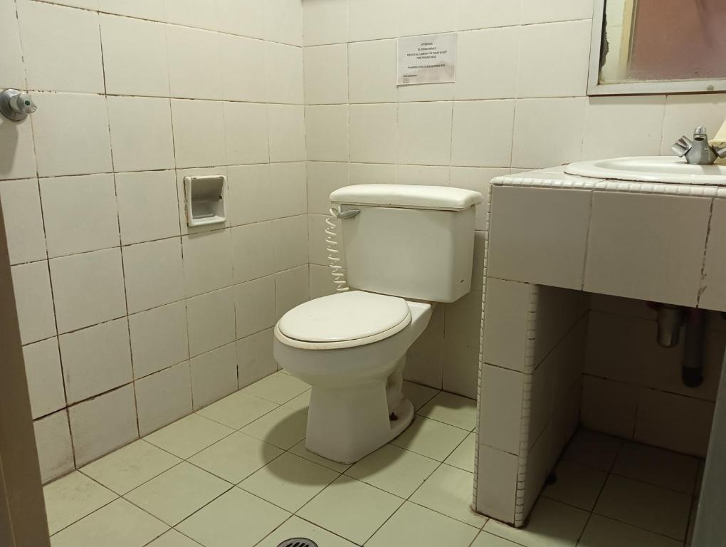 Koupelna v ubytování OYO 90860 Wawasan Inn