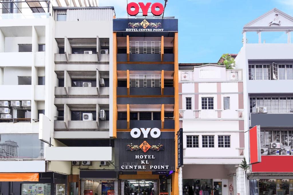 a building with a sign on the side of it at Hotel O Kl Centre Point in Kuala Lumpur