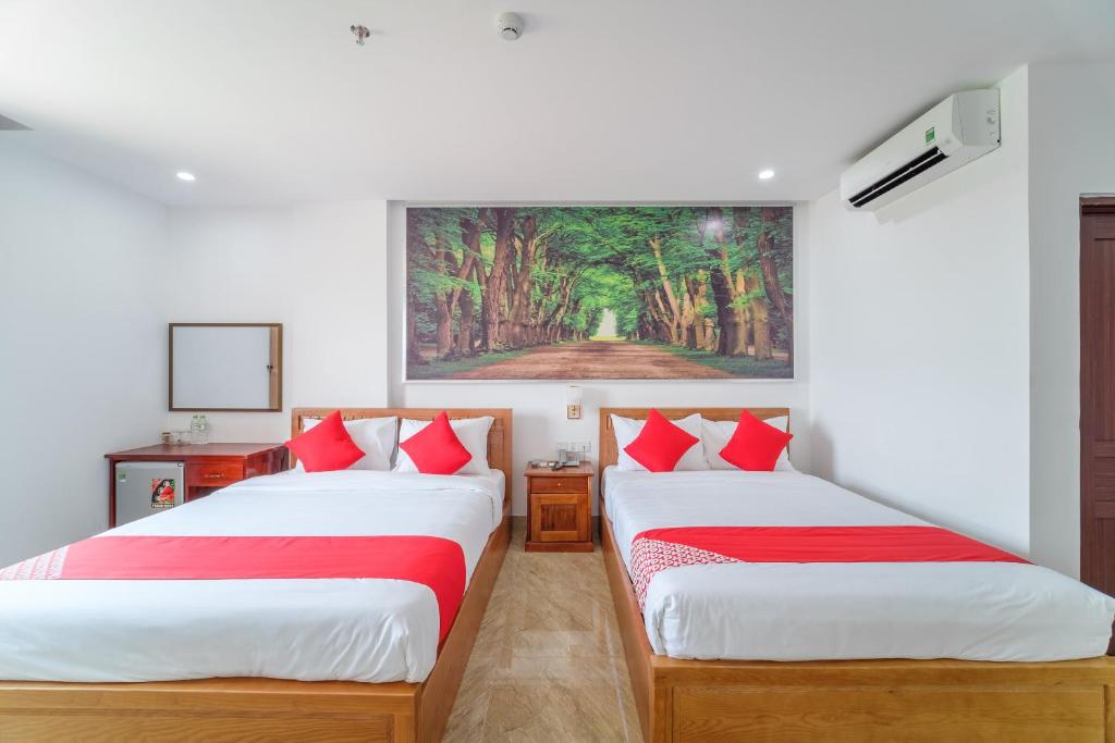 Voodi või voodid majutusasutuse Capital O 215 An Duc Hotel Da Nang toas