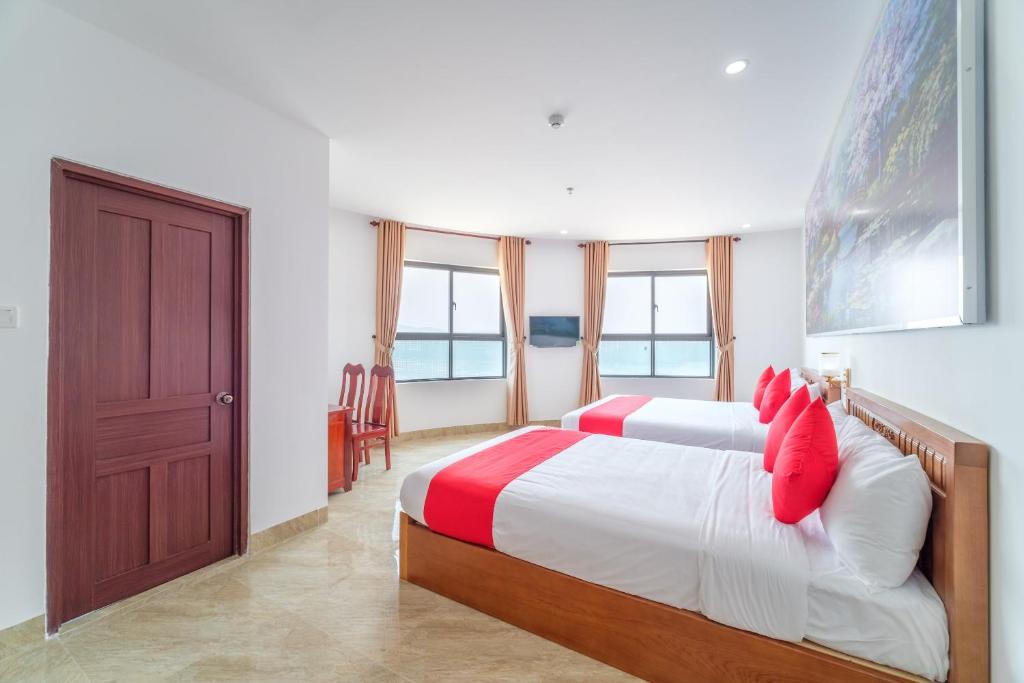 Voodi või voodid majutusasutuse Capital O 215 An Duc Hotel Da Nang toas