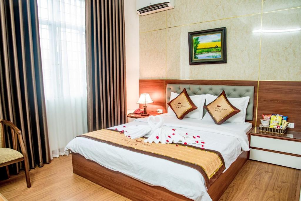 Postel nebo postele na pokoji v ubytování OYO 1143 Thu Giang Hotel