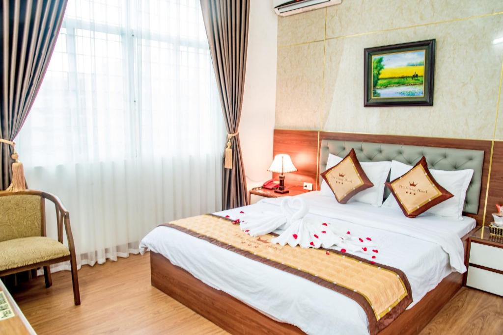 Postel nebo postele na pokoji v ubytování OYO 1143 Thu Giang Hotel