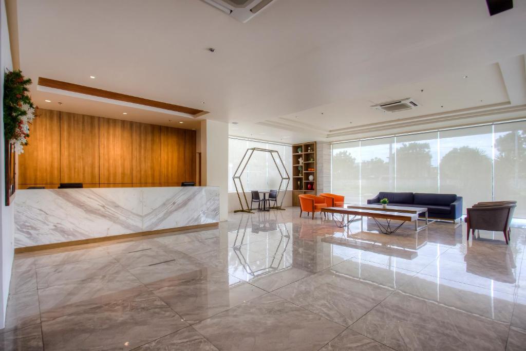 Posezení v ubytování Capital O 827 Speciale Hotel