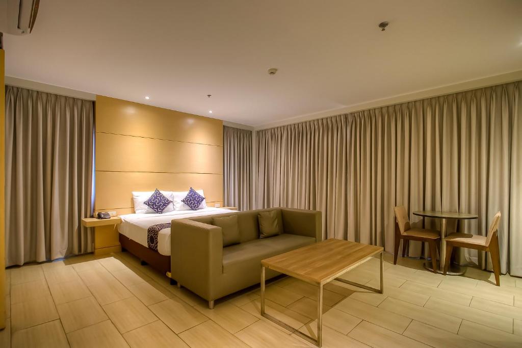 Posezení v ubytování Capital O 827 Speciale Hotel