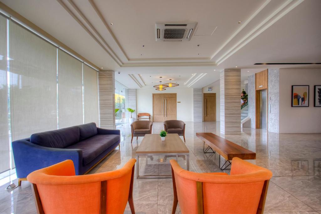 Posezení v ubytování Capital O 827 Speciale Hotel