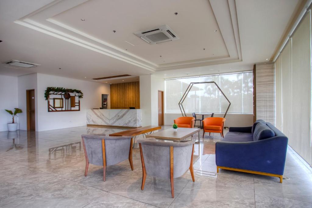 Posezení v ubytování Capital O 827 Speciale Hotel