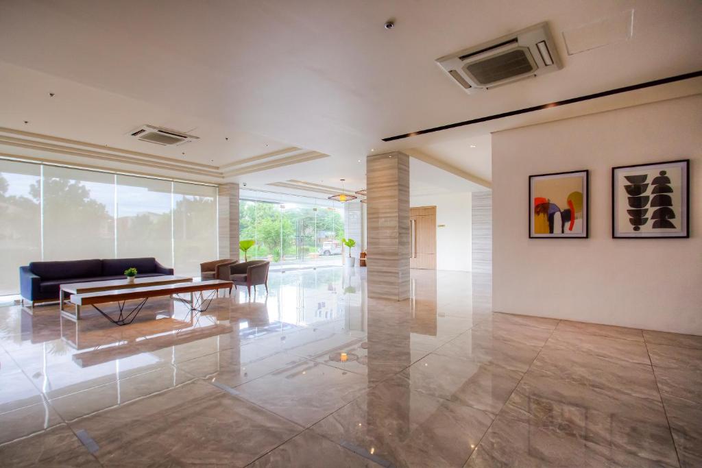 Posezení v ubytování Capital O 827 Speciale Hotel