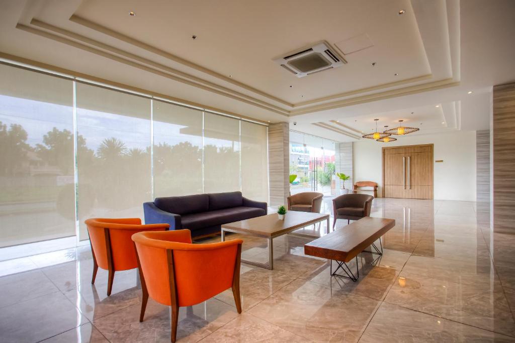 Posezení v ubytování Capital O 827 Speciale Hotel