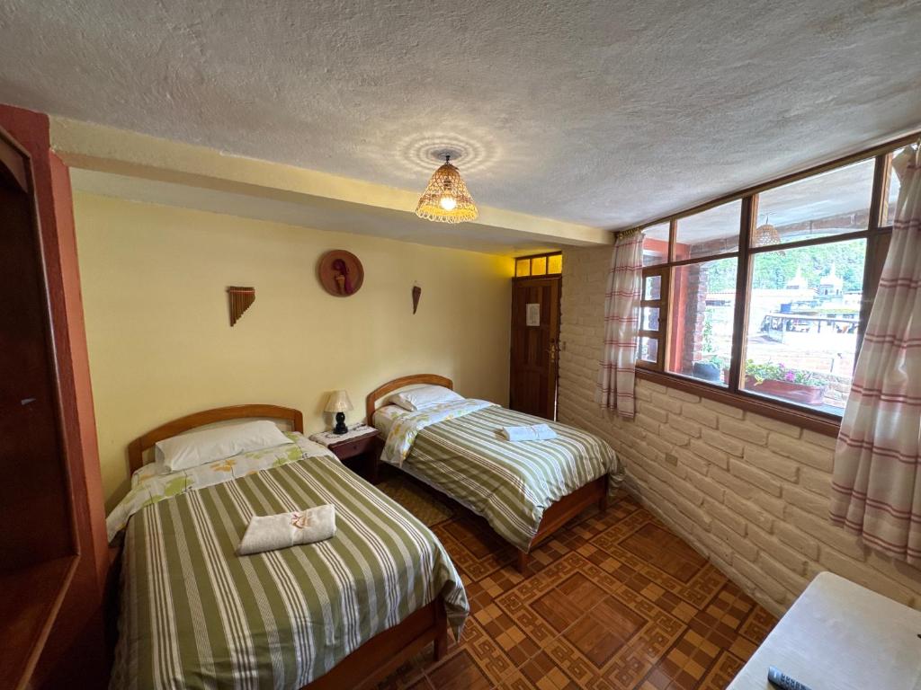 Postel nebo postele na pokoji v ubytování Hotel Donde Ivan