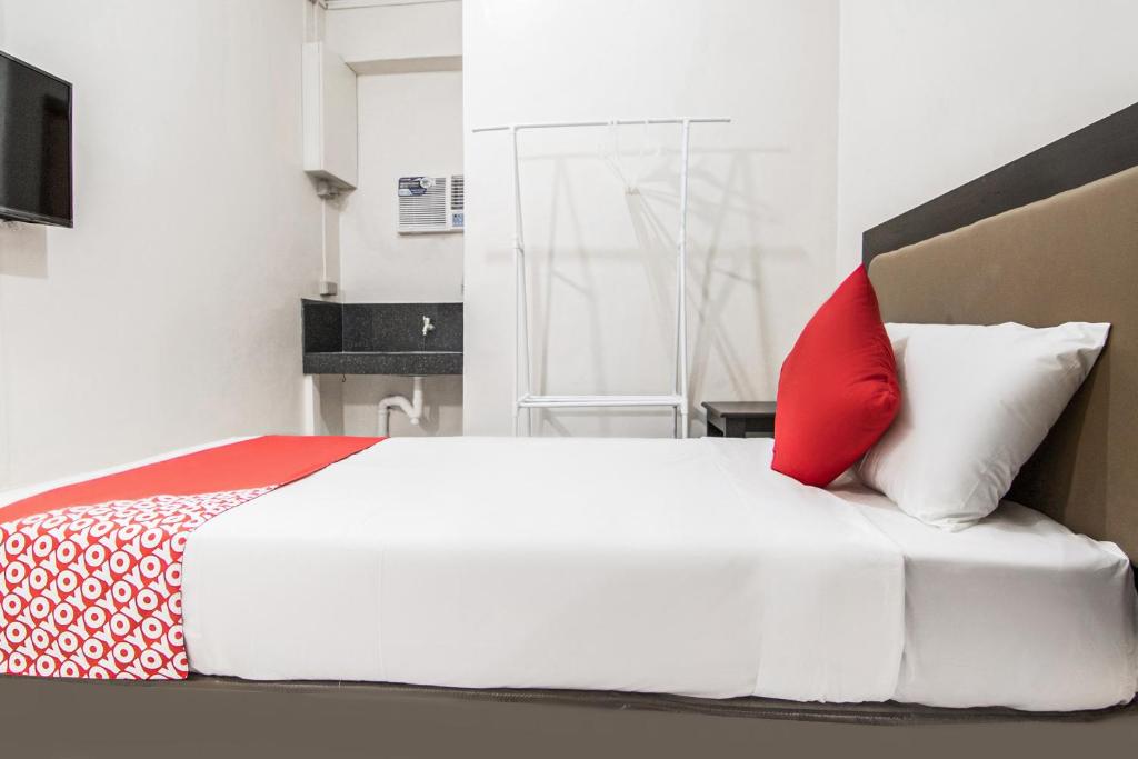 OYO 431 Apollo 11 Apartelleにあるベッド