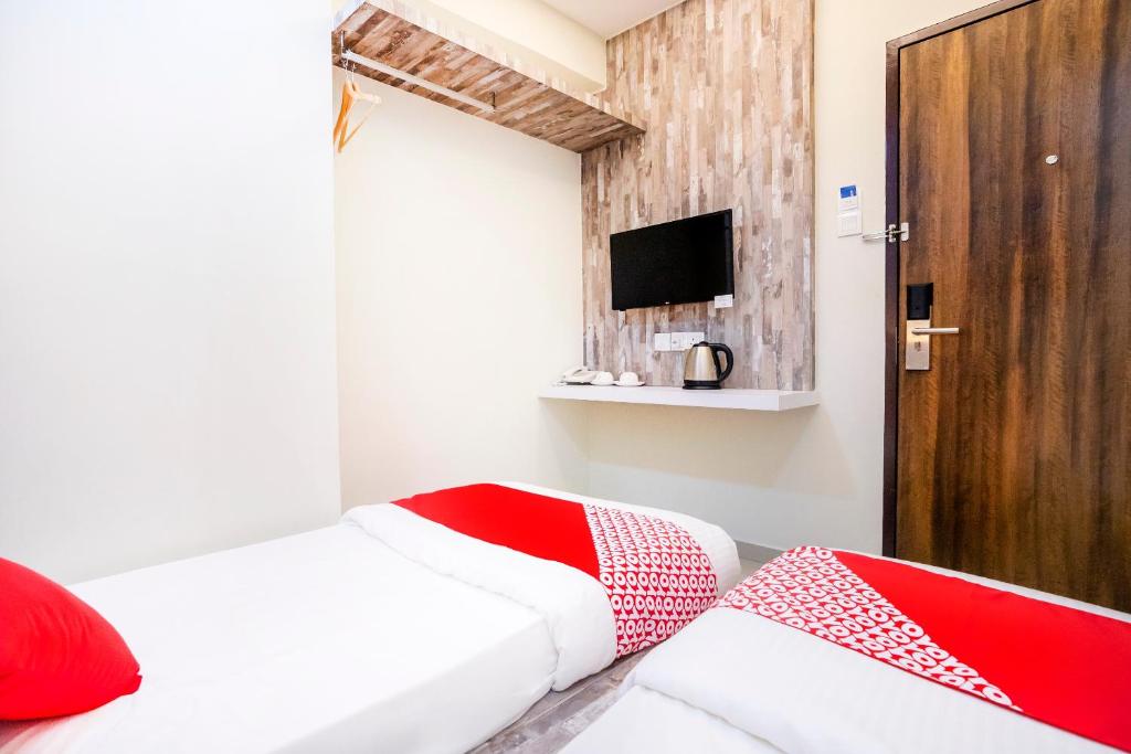 Postel nebo postele na pokoji v ubytování Hope Hotel