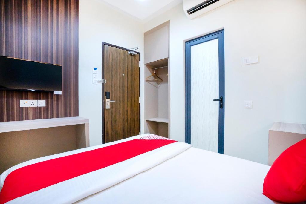Postel nebo postele na pokoji v ubytování Hope Hotel