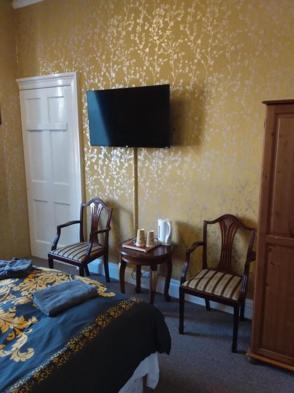 TV a/nebo společenská místnost v ubytování IVY- Braveheart Guest House
