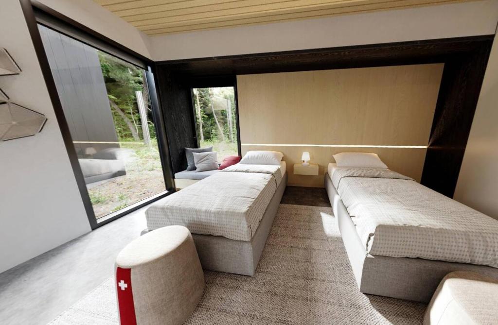 Postel nebo postele na pokoji v ubytování Le Ürban- Chalet avec Terrasse Spa BBQ vue Montagnes-près de Tremblant- nouveau