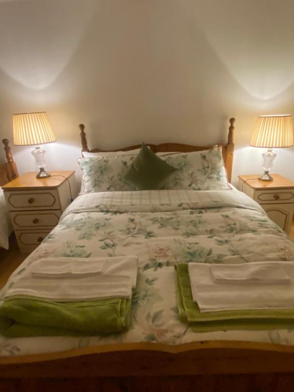 Postel nebo postele na pokoji v ubytování Bayview Guest House