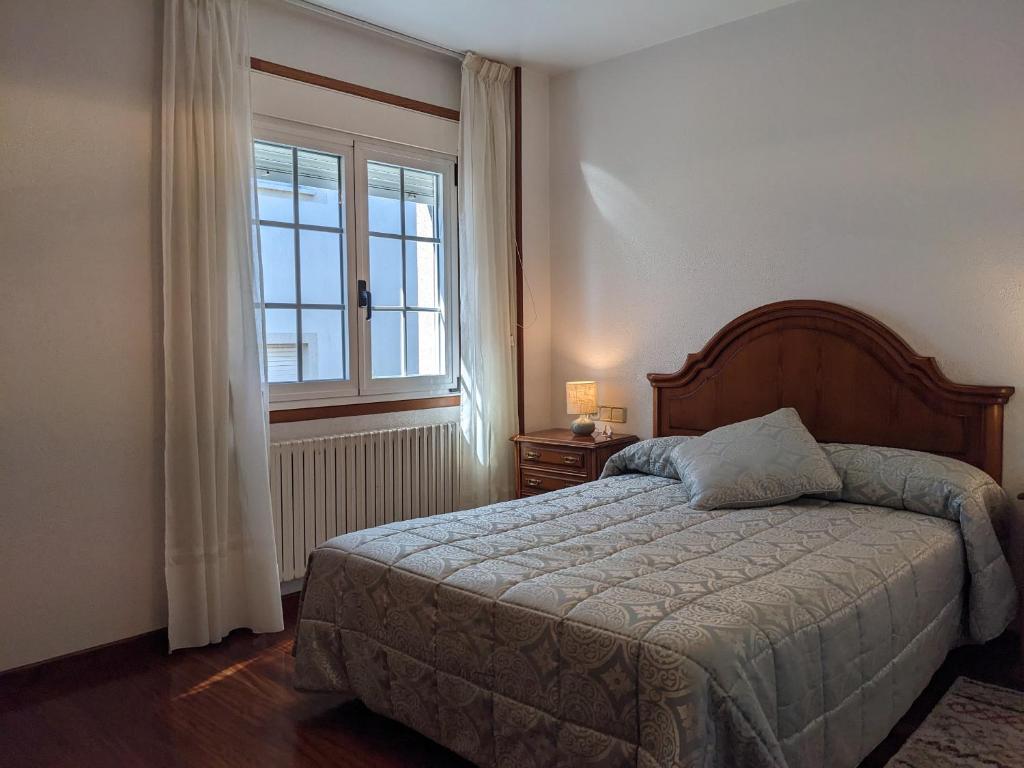 Ένα ή περισσότερα κρεβάτια σε δωμάτιο στο Casa Filomena