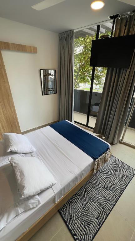 Postel nebo postele na pokoji v ubytování Star AV 37 HOTEL
