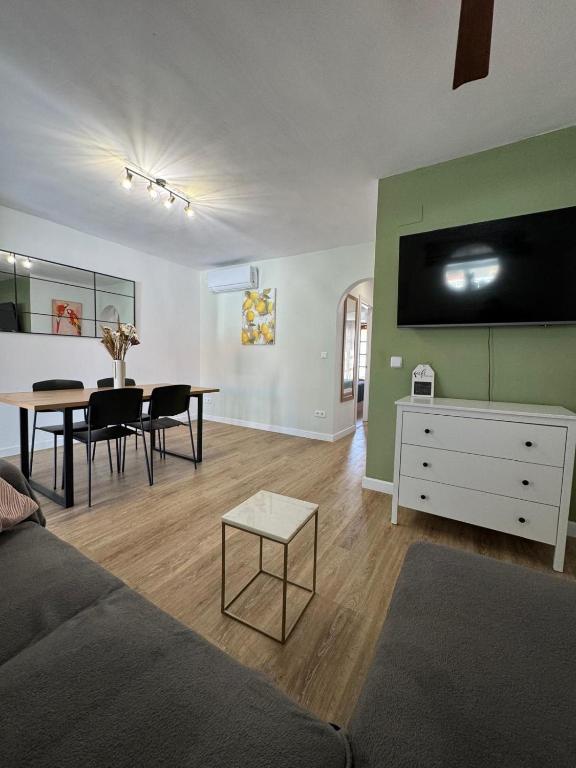a living room with a couch and a table at Casa Limon in Cartagena